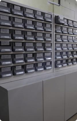Modular pharmacy rack for medicine storage with adjustable shelves.