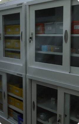 Modular pharmacy rack for medicine storage with adjustable shelves.