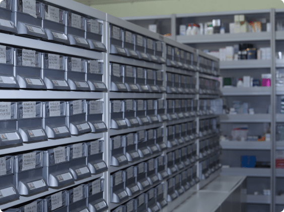 Modular pharmacy rack for medicine storage with adjustable shelves.