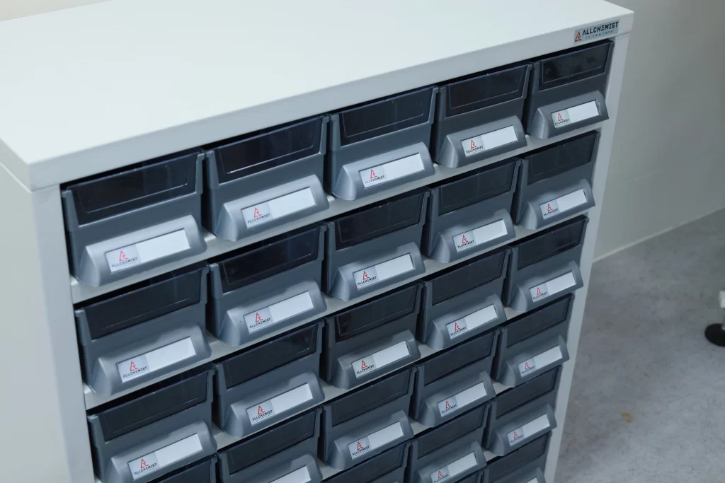 Modular pharmacy rack for medicine storage with adjustable shelves.